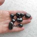 tumbled shungite stones of various shapes