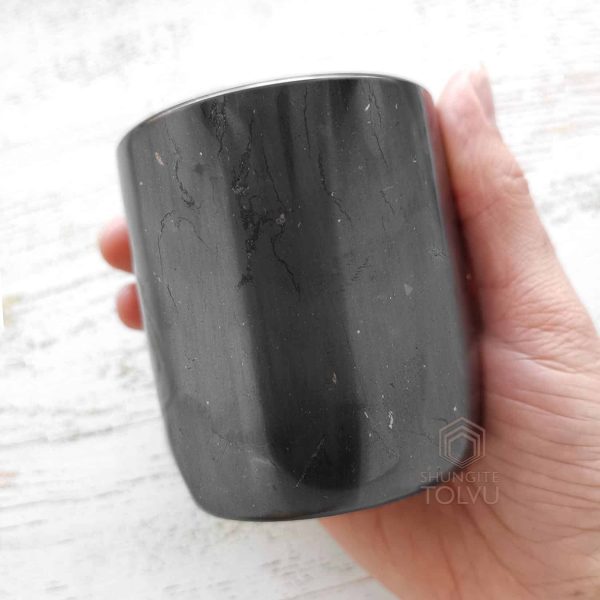 shungite glass in the hand