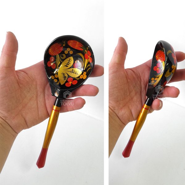 Wooden Spoons in the hand on both sides